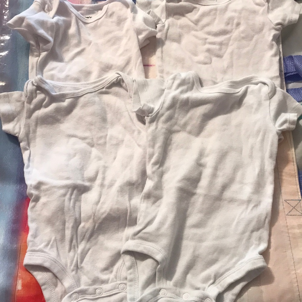 4 pack plain white onsies.